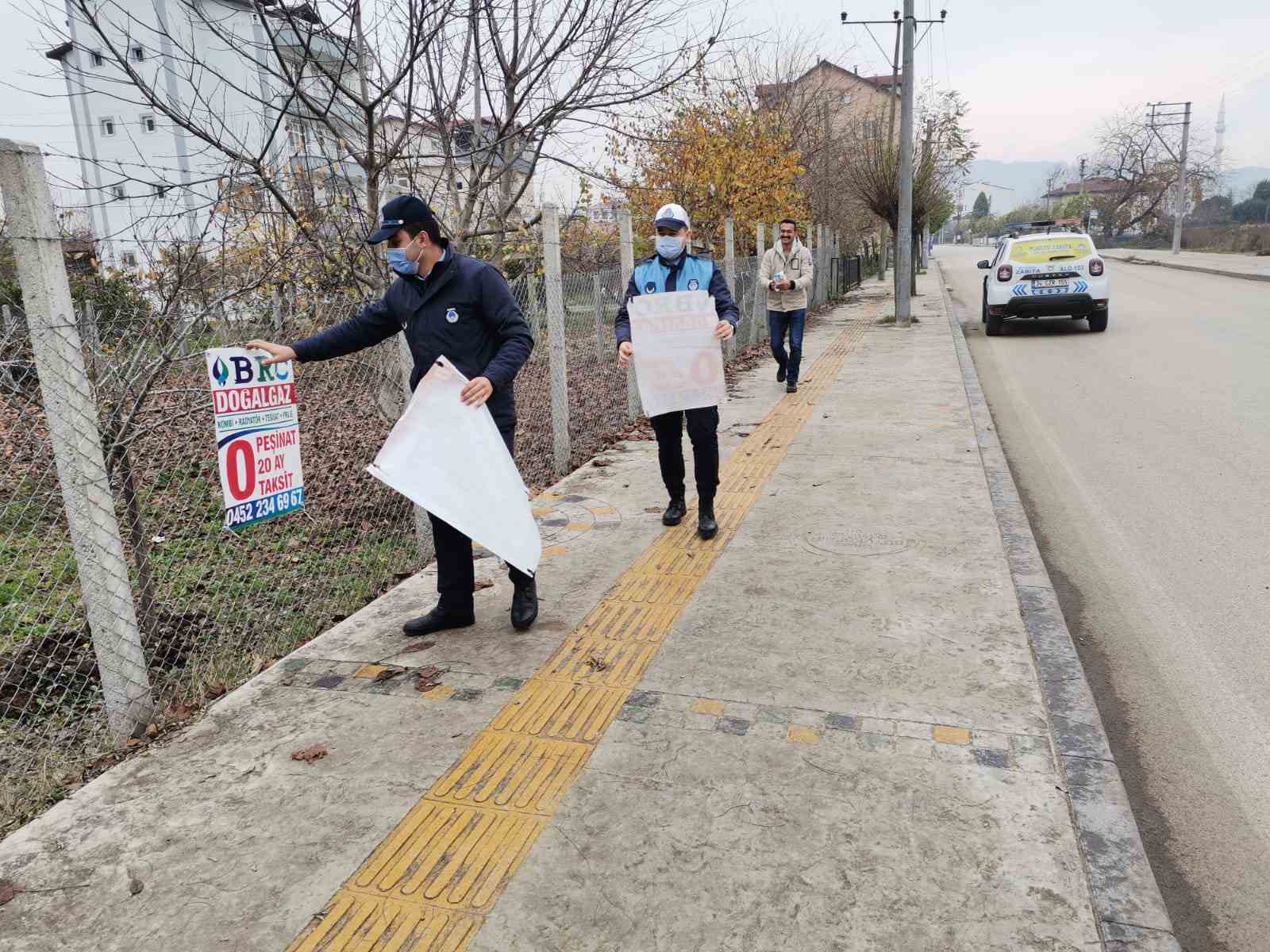 İZİNSİZ AFİŞ VE PANKARTLARA MÜDAHALE